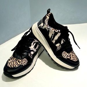 Black and leopard print sneakers